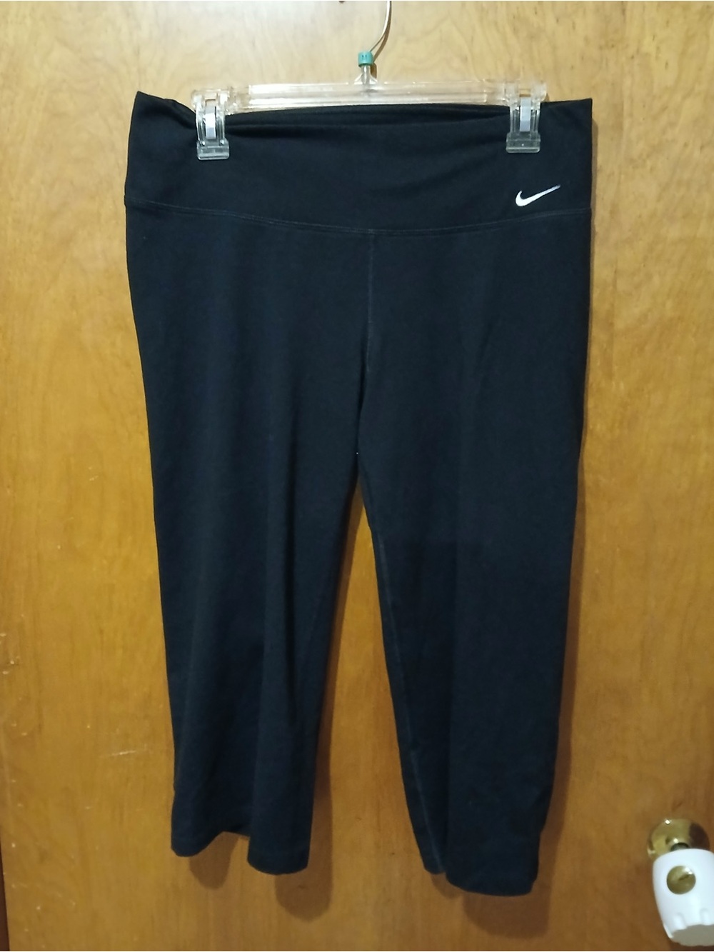 Nike Black Capri Leggings with White Swoosh Accent